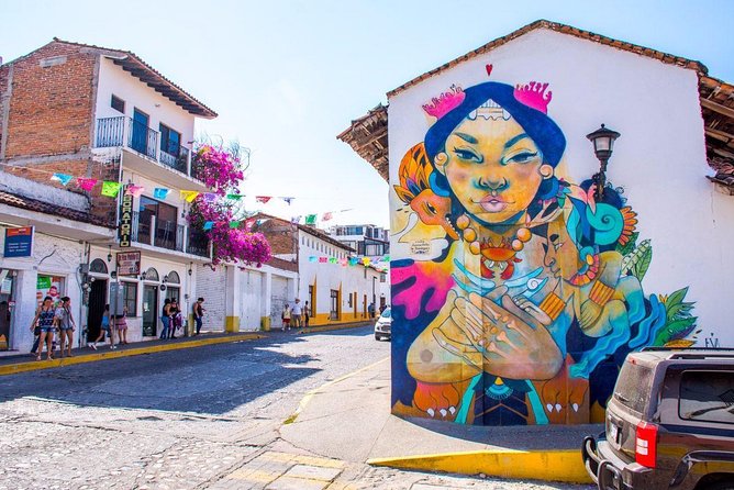 Best of Puerto Vallarta Private Tour: Highlight Treasures and Hidden Gems - Reading Puerto Vallarta through art and public spaces