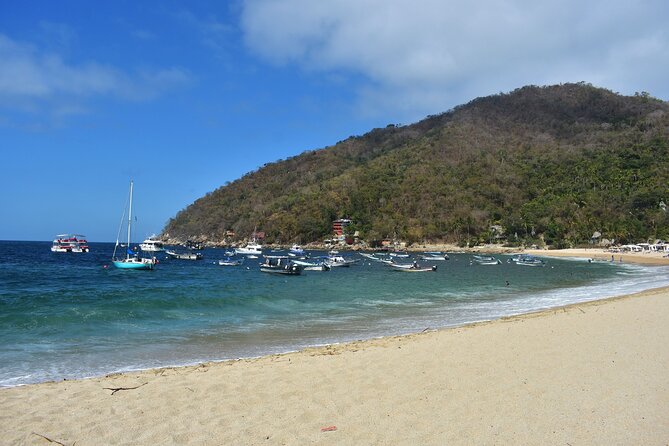 Catamaran Yelapa Beach Tour with Snorkeling, Food and Open Bar - The two-hour return becomes the main show