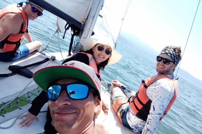Discover Hobie-Cat Sailing and Fish your own Lunch - Watching for Dolphins, Turtles, and Seasonal Whales