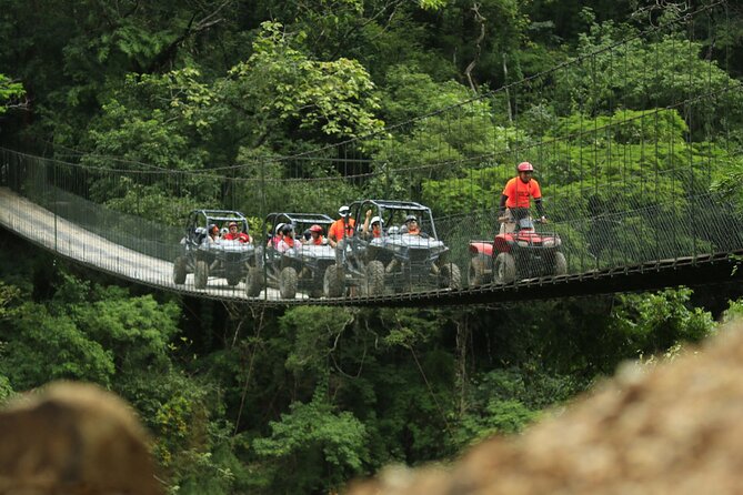 Half Day ATV and RZR Tour to El Jorullo Hanging Bridge - Riding the mountain trails