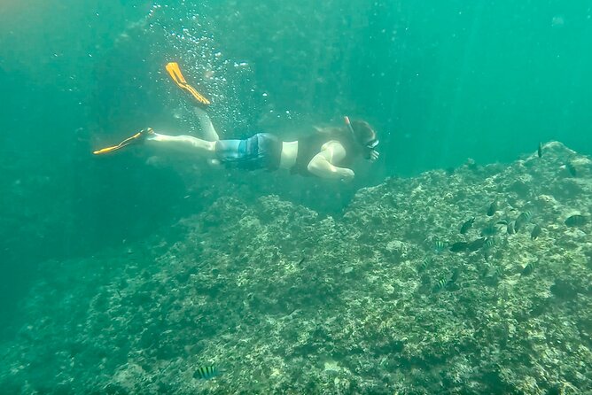 Los Arcos Snorkeling & 5 Island Adventure - Photo time inside the arches and caves
