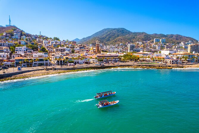 Banderas Bay from the air, with a boat crossing towards Puerto Vallarta