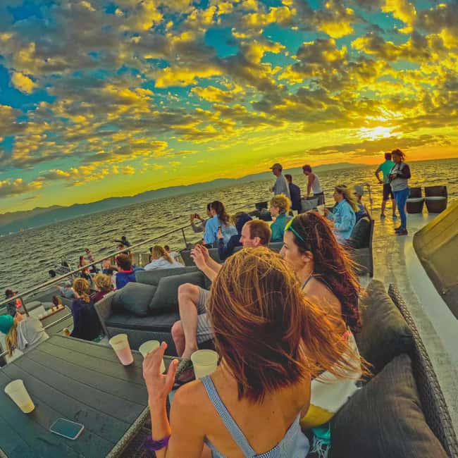 Puerto Vallarta: Mega Yacht Whale Watching Sunset Cruise - Booking, cancellation, and language details